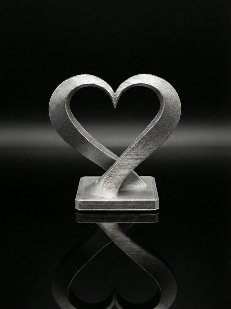 Ineinander verschlungene Herz-Miniaturskulptur (5cm)