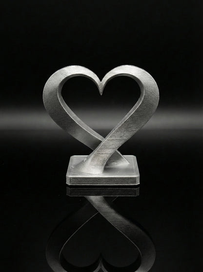 Ineinander verschlungene Herz-Miniaturskulptur (5cm)