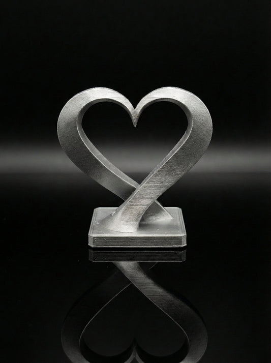 Ineinander verschlungene Herz-Miniaturskulptur (5cm)